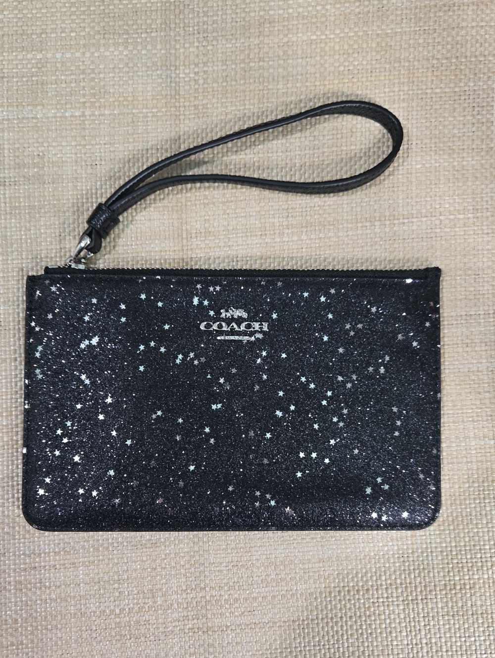 Like-new Coach Black Glitter Star Wristlet Pouch